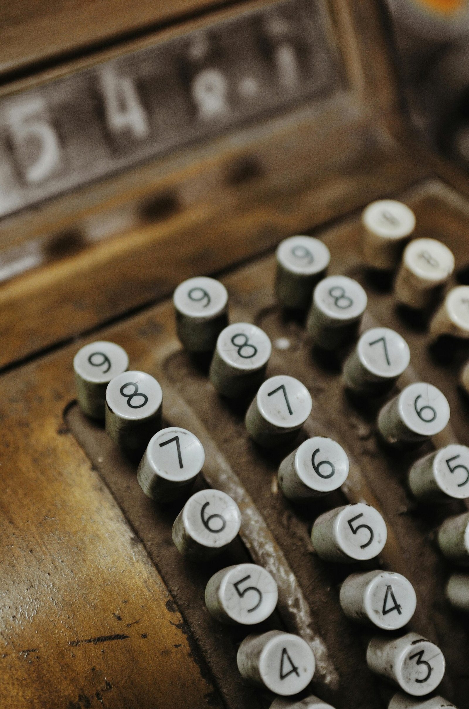 Close-up of a vintage cash register showcasing its antique keys, set in Chile.